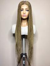 “Tej" Middle Part Corn Row Lace Closure Wig